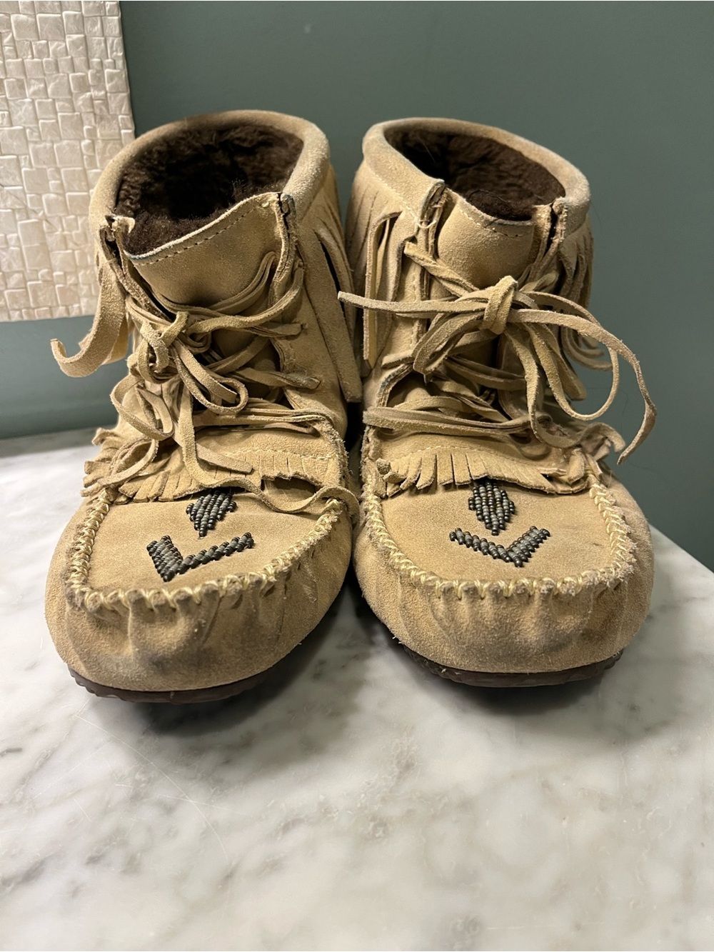 Fringed Suede Moccasin Booties in Tan